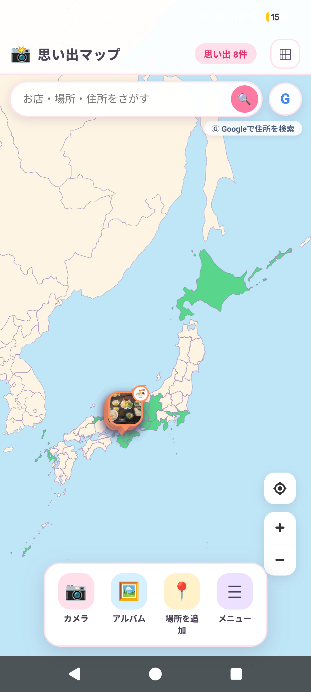 思い出マップの画面。日本地図の上に、訪れた県が緑色で塗られ、食事の写真がピンとして立っている